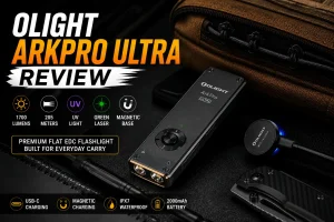 Olight ArkPro Ultra premium flat EDC flashlight featuring a 1700-lumen flood beam, 800-lumen spotlight, UV light, green laser, USB-C and magnetic charging, shown with everyday carry gear.
